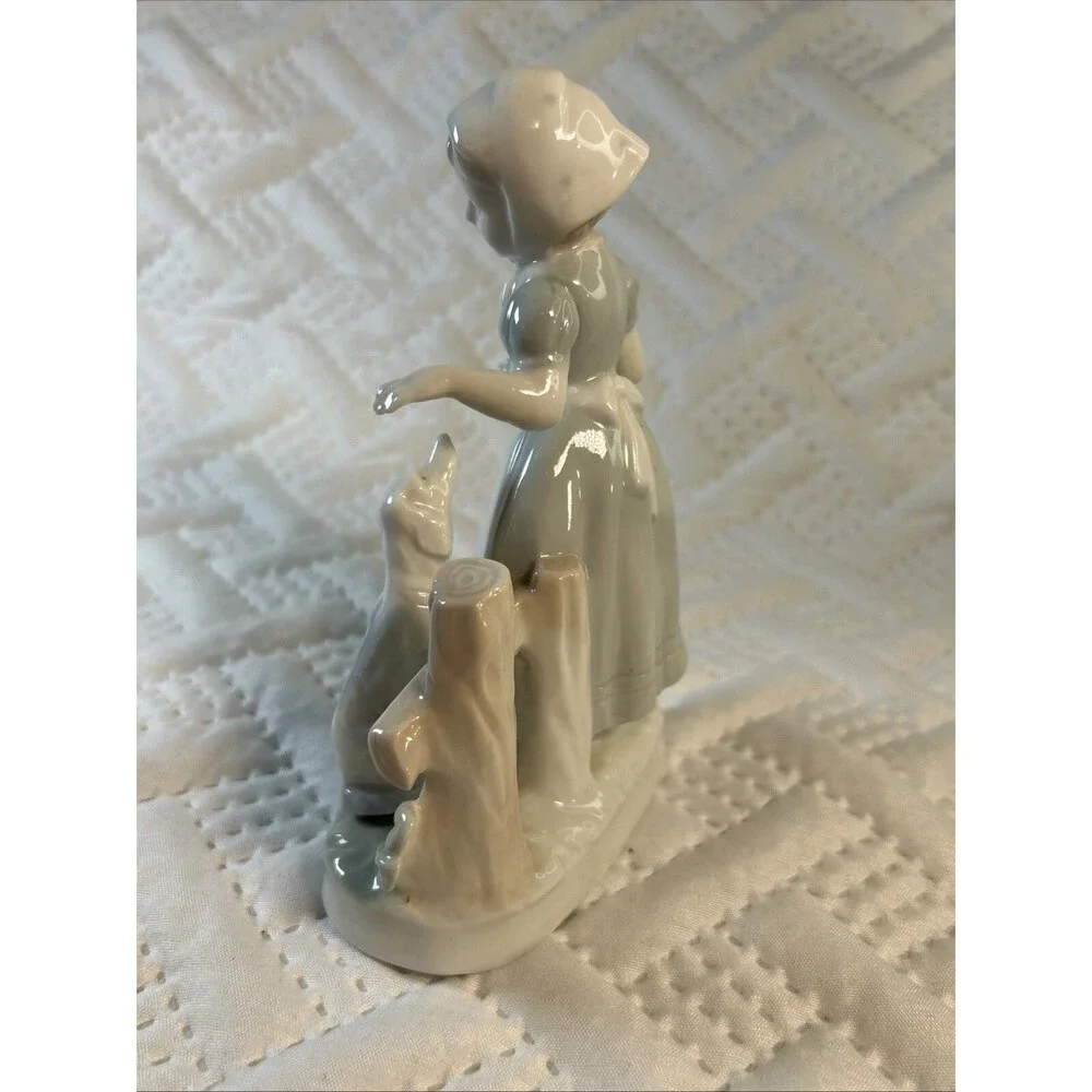 Vintage Porcelain Japan  Blue and White Dutch Girl with Dog Figurine Decor